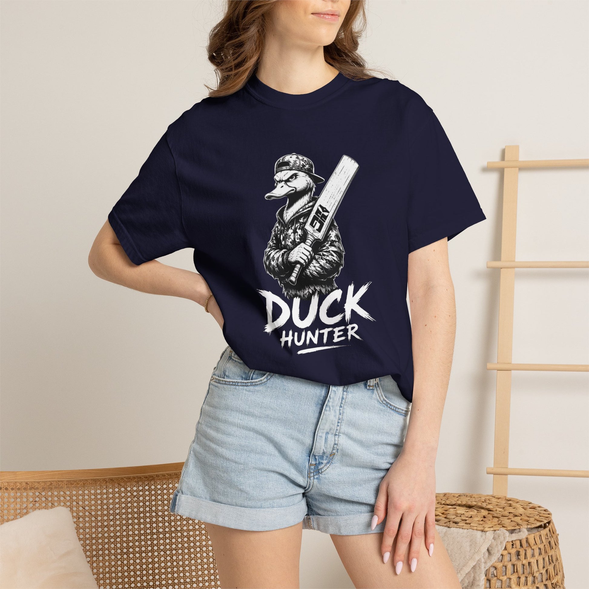 Close up of Duck Hunter t-shirt graphic showing duck character and Duck Hunter text on garment-dyed cotton