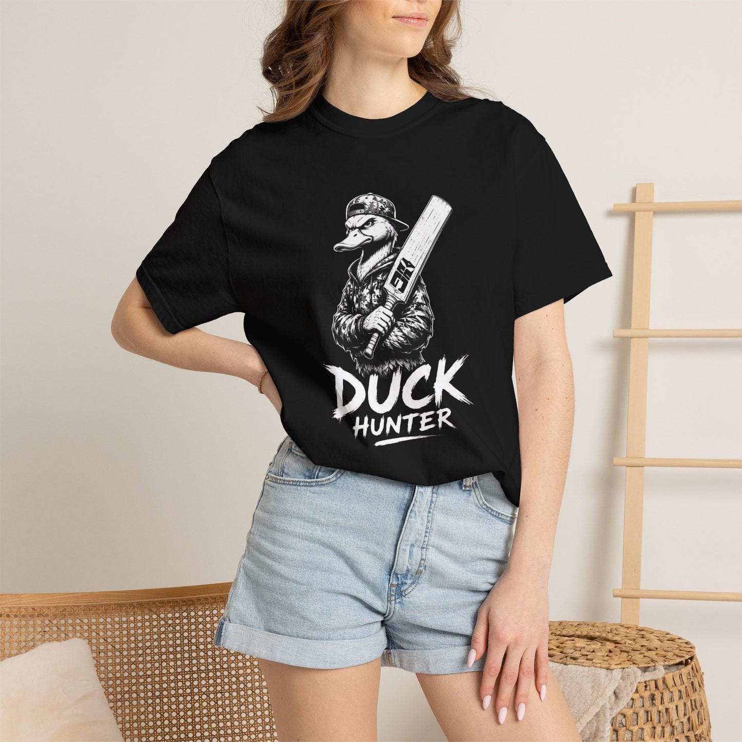 Model wearing Duck Hunter t-shirt, relaxed unisex fit cricket duck award graphic tee by Odyssey Camp & Co.