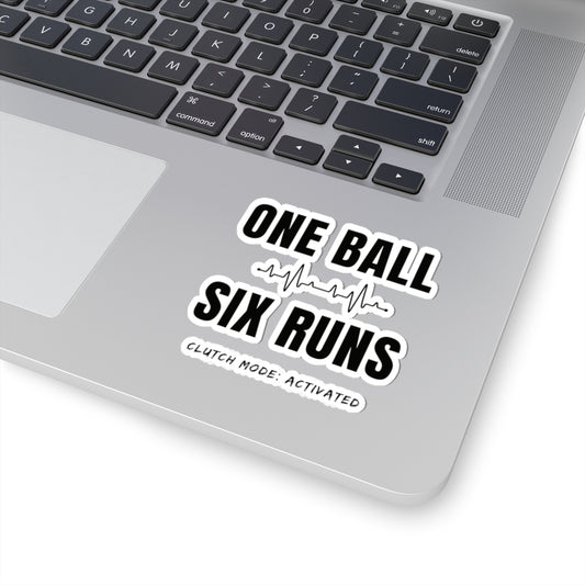Laptop with a sticker reading 'One Ball Six Runs Clutch Mode Activated' on a white background