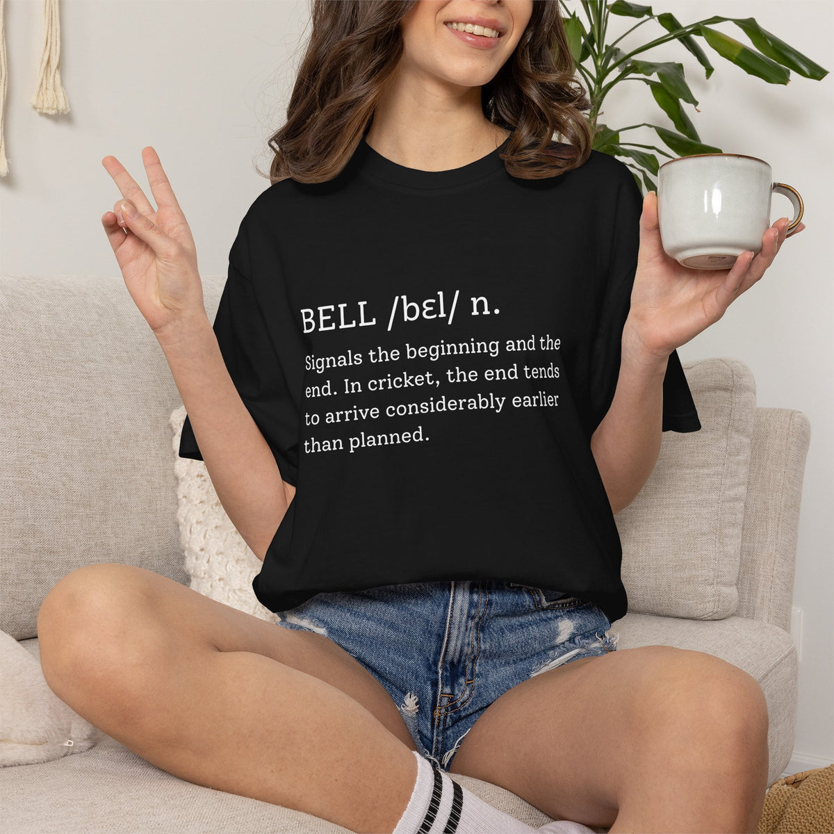 BELL Cricket Dictionary T-Shirt by Odyssey Camp & Co, white typewriter-style definition print on a garment-dyed cotton tee.